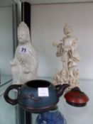 TWO CHINESE BLANC DE CHINE FIGURES, AND A SMALL ORIENTAL TEAPOT.