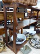 A MAHOGANY WALL MOUNTING RACK OF THREE SHELVES