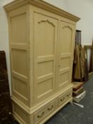 A LARGE JOHN LEWIS GOOD QUALITY PAINTED TWO DOOR WARDROBE. W 145 X D 66 X H 214CMS.