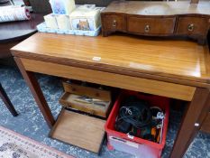 A TEAK SWIVEL TOPPED TABLE ON SQUARE LEGS