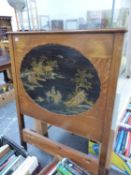 AN EDWARDIAN OAK CHINOISERIE DECORATED HEADBOARD PANEL.