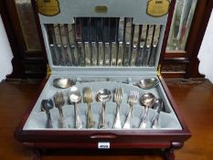 A VINERS SILVER PLATED PART CUTLERY SET IN A FOLDING CANTEEN.