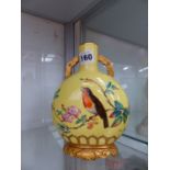 A PORCELAIN ORIENTAL STYLE YELLOW GROUND VASE.