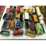 THIRTY HORNBY O GAUGE GOODS WAGONS, TANKERS AND TRUCKS