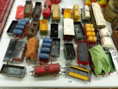 THIRTY HORNBY O GAUGE GOODS WAGONS, TANKERS AND TRUCKS