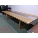 A CONTEMPORARY OAK AND STEEL TOPPED REFECTORY TABLE. W 300 x D 124 x H 75cms.