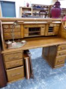 A GOOD QUALITY VICTORIAN STYLE OAK ROLL TOP WRITING DESK. W 159 X D 74 X H 125CMS.