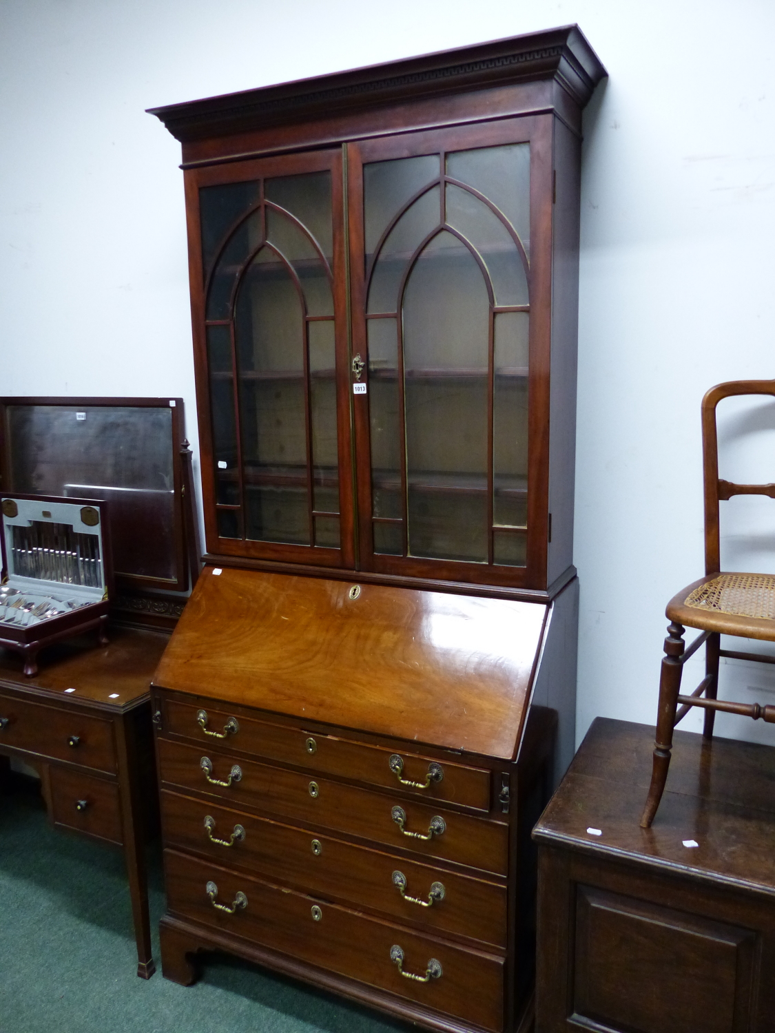 A MAHOGANY BUREAU BOOKCASE WITH GLAZED DOOR TOP