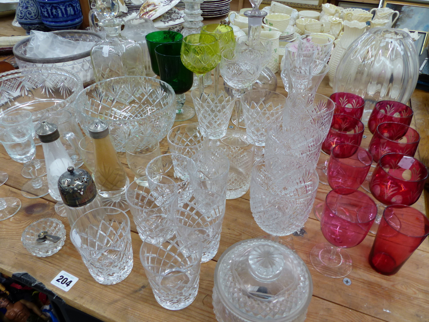 A QUANTITY OF ANTIQUE AND LATER CUT GLASS WARES.