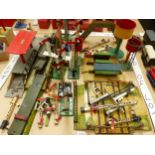 A COLLECTION OF HORNBY PLATFORMS, SIGNALS, WATER TANKS, A FOOT BRIDGE AND A LEVEL CROSSING
