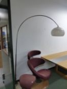 A TUBULAR CHROME ARCHED STANDARD LAMP WITH WHITE SHADE