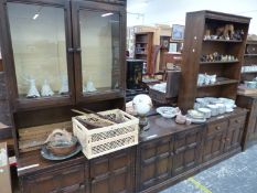 AN OAK DRESSER WITH ENCLOSED SHELF BACK OVER TWO DRAWERS AND DOORS. W 98 x D 49.5 x H 197.5cms.