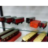 FOUR VARIOUS HORNBY BOXED O GAUGE RED LIVERIED CARRIAGES TOGETHER WITH A No. 21 COACH