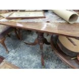 A MAHOGANY RECTANGULAR TOPPED TRIPOD TABLE, THE TOP. W 118 x D 82cms.