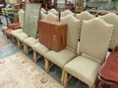 A SET OF 12 17TH C. STYLE UPHOLSTERED BACK DINING CHAIRS.