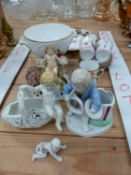 THREE PORCELAIN CHERUB FIGURINES, A SMALL CABINET PLATE, A PORCELAIN SPILL HOLDER ETC.