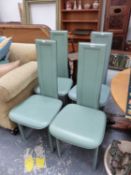 A SET OF FOUR GREEN LEATHER UPHOLSTERED DESIGNER SIDE CHAIRS.