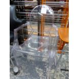 A LOUIS GHOST CLEAR PLASTIC ELBOW CHAIR