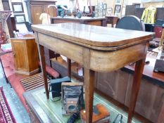 A GEORGE III LINE INLAID MAHOGANY GAMES TABLE