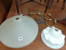 TWO BRASS LIGHT FITTINGS AND TWO VARIOUS SHADES.