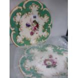 A PAIR OF ROCKINGHAM WORKS HAND PAINTED FLORAL CABINET PLATES.