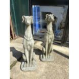 A PAIR OF COMPOSITE GARDEN FIGURES OF WHIPPETS.