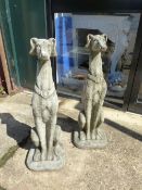 A PAIR OF COMPOSITE GARDEN FIGURES OF WHIPPETS.