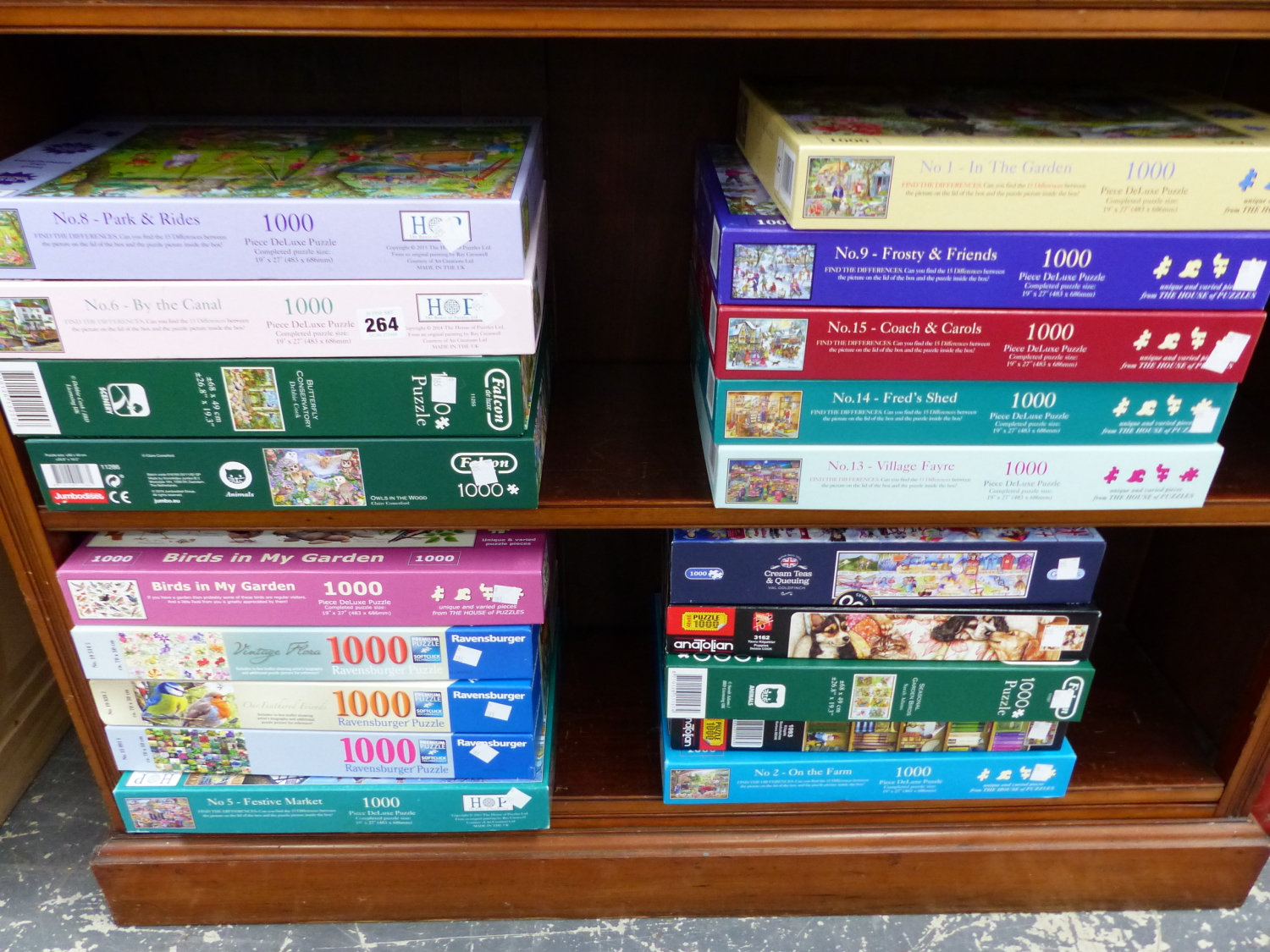 A LARGE COLLECTION OF VARIOUS 1000 PIECE JIGSAW PUZZLES.