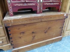 A LARGE VICTORIAN PINE BLANKET BOX.