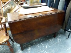 A MAHOGANY DROP FLAP DINING TABLE ON BLIND FRET CARVED SQUARE SECTIONED LEGS