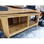 A PINE BUTCHERS BLOCK WITH SHELF UNDERTIER, W. 152 x D. 60 x H. 81cms.