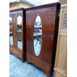 A CHEQUER LINE INLAID MAHOGANY WARDROBE, THE CENTRAL OVAL MIRRORED DOOR OVER A LONG DRAWER