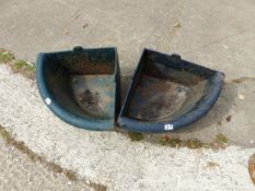 A PAIR OF CAST IRON CORNER TROUGHS