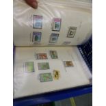 AN ALBUM OF INTERESTING WORLD STAMPS, VARIOUS TRAIN AND RAIL EPHEMERA, LOOSE STAMPS ETC