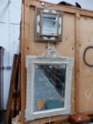 A RECTANGULAR MIRROR IN A WHITE PAINTED FOLIATE CARVED FRAME WITH A SMALLER MIRROR IN GILT AND WHITE