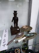 AN UNCLE SAM CAST IRON MONEY BOX, A SILVER BACKED HAIR BRUSH, A MAGNIFYING GLASS AND FOUR DISHES