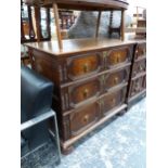 AN OAK CHEST OF THREE GRADED LONG DRAWERS APPLIED WITH CENTRAL AND FLANKING PAIRS OF SPINDLES TO THE