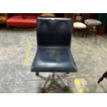 A BLUE LEATHER AND CHROME ADJUSTABLE DESK CHAIR