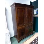 A MAHOGANY WARDROBE, THE DENTIL CORNICE ABOVE DOORS EACH WITH TWO PANELS. W 136 x D 65 x H 198.