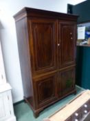 A MAHOGANY WARDROBE, THE DENTIL CORNICE ABOVE DOORS EACH WITH TWO PANELS. W 136 x D 65 x H 198.