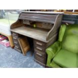 AN OAK SLATTED ROLL TOP DESK ON FOUR DRAWER PEDESTALS