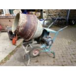 AN ELECTRIC CONCRETE MIXER COMPLETE WITH TRANSFORMER AND ANGLE CUTTER