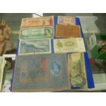 A LARGE COLLECTION OF MIXED WORLD COINS AND BANKNOTES.