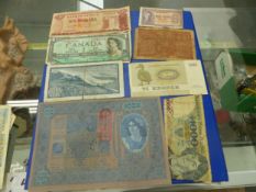 A LARGE COLLECTION OF MIXED WORLD COINS AND BANKNOTES.