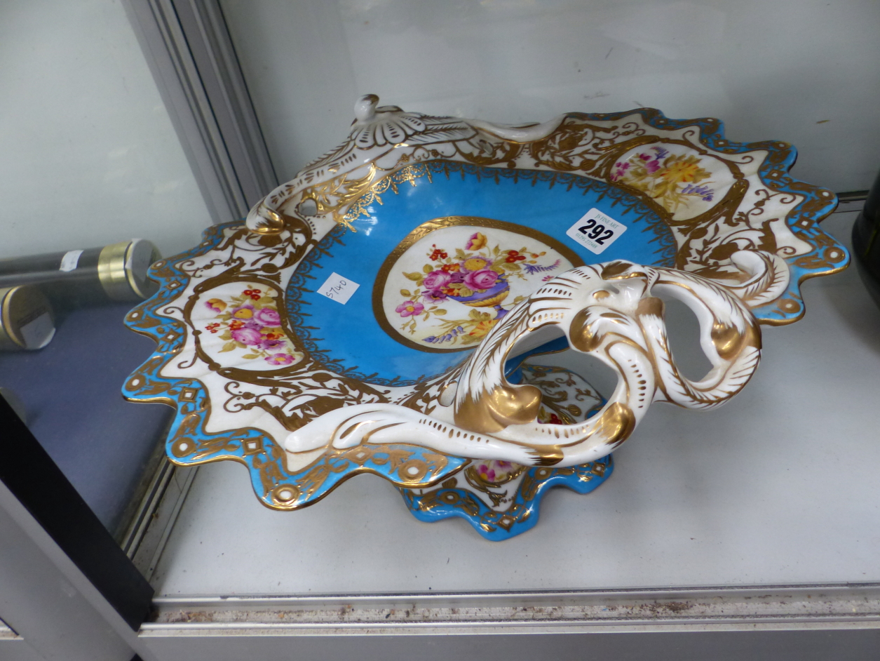 A SEVRES STYLE COMPORT PAINTED WITH FLOWERS ON A TURQUOISE GROUND