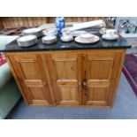 TWO BLACK LARVIKITE TOPPED PINE CUPBOARDS, ONE WITH TWO DOORS AND THE OTHER WITH THREE