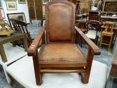 A TEAK AND LEATHER ADJUSTABLE ARM CHAIR