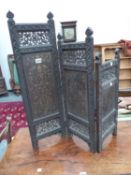 A BARLEY TWIST TORCHERE, AN ORIENTAL BRASS INLAID EBONY THREE FOLD SCREEN AND AN ART DECO TWO TIER