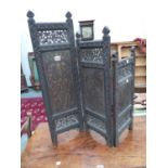 A BARLEY TWIST TORCHERE, AN ORIENTAL BRASS INLAID EBONY THREE FOLD SCREEN AND AN ART DECO TWO TIER