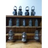 TWELVE VARIOUS OIL LAMPS